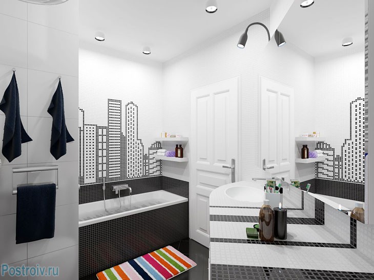 Черно-белая ванная комната с ярким ковриком. Фото