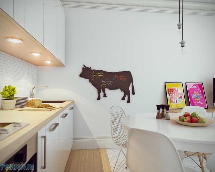 Корова на стене. Фото